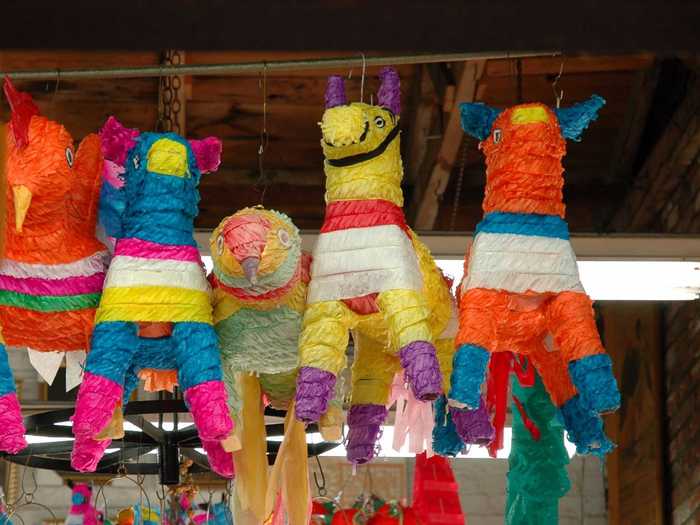 And of course, there are tons of piñatas that are filled with candies and cookies.