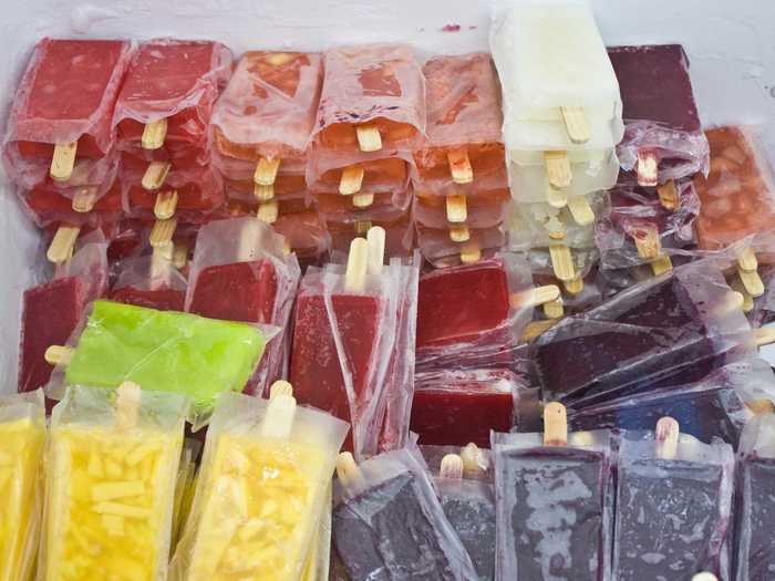 Paletas are Mexican popsicles made from fruits, chilly powder, salt, and lime. They come in a wide variety of unconventional flavors including mango chili, cucumber lime, and cinnamon rice pudding.