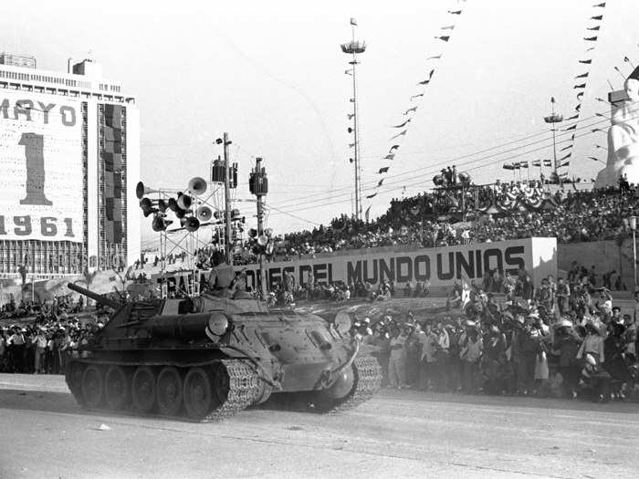 ... while brand-new Czech-built armored tanks provided by the Soviet bloc streamed through central Havana.