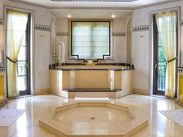 And in the master bath, a tub stands like a throne.