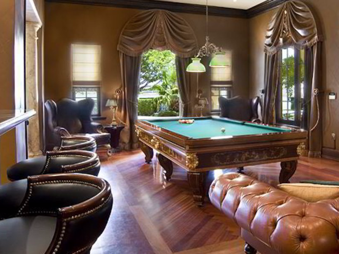 A swanky billiards room is another of the home