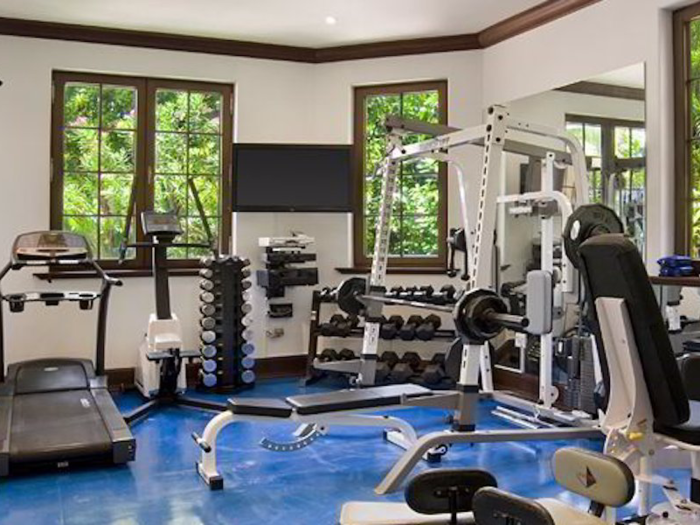 The home also has an exercise room with its own TV.