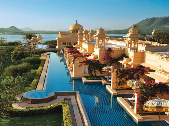 Take a private boat to the Oberoi Udaivilas, called the Best Hotel In India by TripAdvisor.