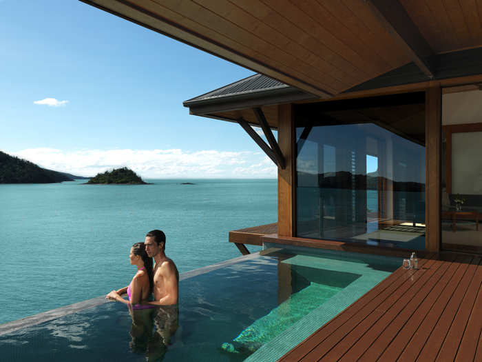 Soak in a private, infinity-edge pool while overlooking the Great Barrier Reef at Qualia, a hotel on Australia