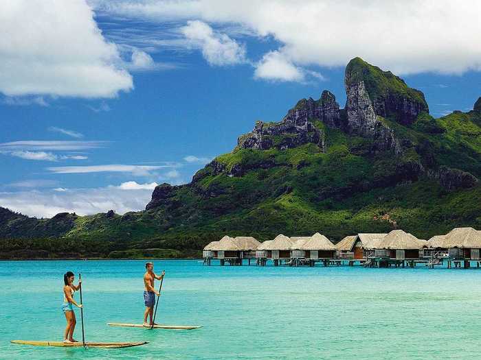 Stay in the private over-water bungalow suites in the South Pacific