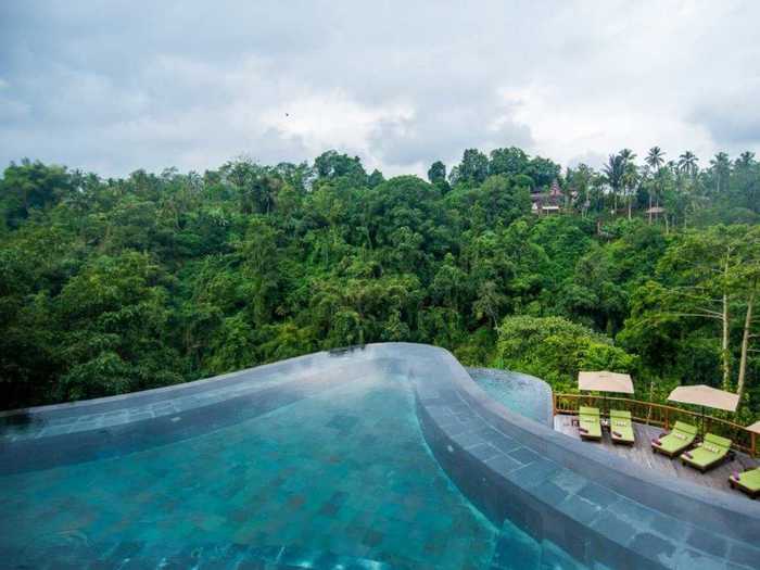 Swim in the award-winning infinity pools of the 5-star Hanging Gardens Ubud in Bali