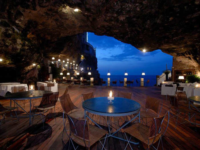 Dine inside a cave at the Hotel Grotta Palazzese in Polignano a Mare in Puglia, Italy, which is famous for its restaurant that sits in an original limestone cave.