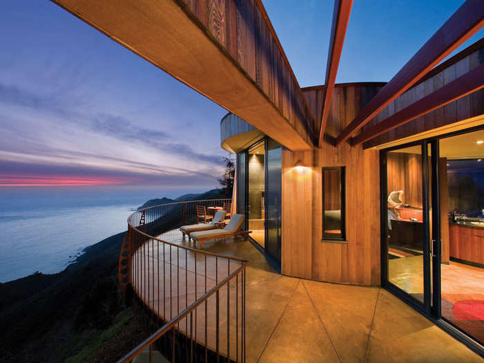 Stay at the eco-friendly Post Ranch Inn, a luxury resort perched atop the cliffs of Big Sur in southern California.