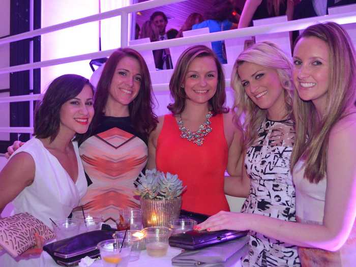 Elizabeth Keane (Fitch Ratings), Meghan Waters (Bloomberg LP), Carly Lintvedt (Meridian Funds), Mara Durkin, and Alyssa Calderone were hanging out near the dance floor.