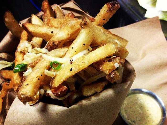 TENNESSEE: Farm-to-table restaurant Stock and Barrel might be known for its gourmet burgers, but the duck confit fries steal the show. In 2014, the spot took home Metro Pulse