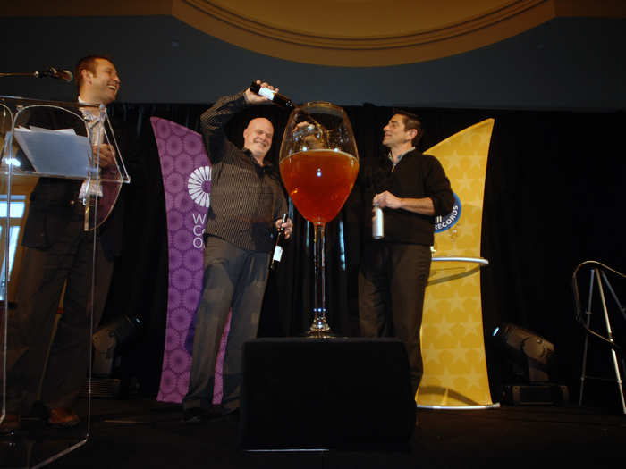 The Guinness World Record flute of ice wine is poured by by members of the Marynissen Estate Winery as part of the Niagara Icewine Festival in Niagara Falls, Ontario, January 14, 2011. Over 30 Ontario wineries poured twenty seven liters of icewine into a four-foot-tall flute, setting a new record, local media reported.