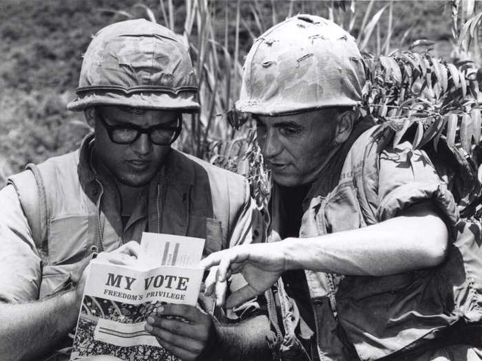 A Marine fills out his voter registration card for the upcoming 1969 presidential election.