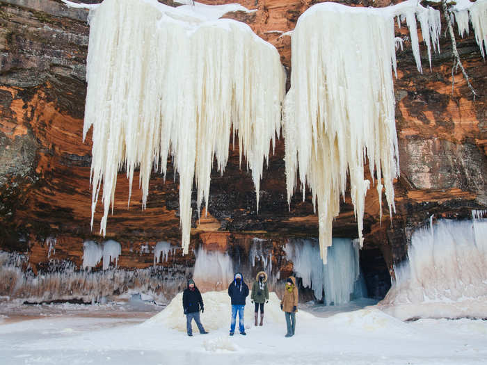 The Apostle Islands National Lakeshore calls to the explorer in all of us. An archipelago of 21 wilderness islands dot the waters of Lake Superior, Wisconsin, and many contain sea caves, frozen waterfalls, and chandeliers of ice.