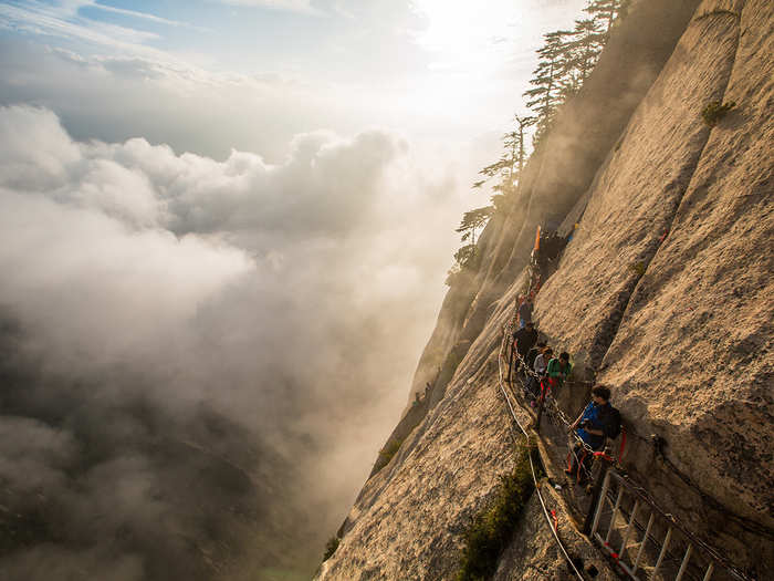 Climbers who dare hike Mount Huashan, considered one of the most dangerous trails in the world, must face near-perpendicular cliffs, rickety staircases, and a plank pathway that clings to the rock face. The 7,000-foot ascent is worth it, however, with the above-the-clouds views of China