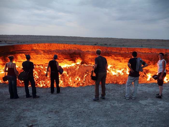 Daring travelers can peer into "the door to hell," a burning crater in Derweze, Turkmenistan, that Soviet geologists accidentally created when drilling for natural gas in 1971. They expected the fire to last for only a few days, but it burns on four decades later.