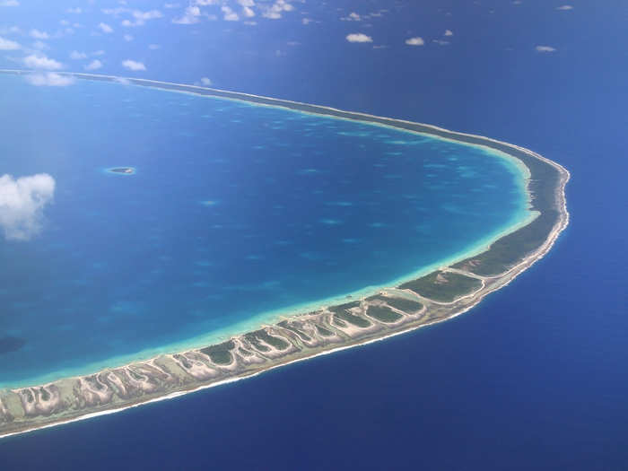 From the sky, Rangiroa appears like a string of pearls laid upon the South Pacific Ocean. Two-hundred and forty little islets, each no more than three feet in elevation, make up the world