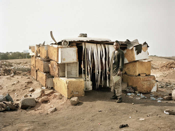 The living conditions in the e-waste hubs are vicious. Workers in Agbogbloshie, Ghana, make shelters out of scraps and waste inside the parameters of the landfills.