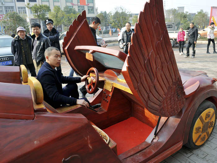 Yu Jietao, 26-year-old wood carver, also saw the potential in wooden vehicles and spent 100,000 yuan (£10,247, $16,010) on his invention. It can travel as fast as 30 km/h per hour.