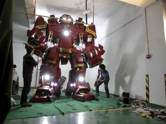 Xing Yile (L), a 26-year-old middle school art teacher, took two months to build a homemade replica of the Hulkbuster "Iron Man" armoured suit from the movie "Avengers: Age of Ultron."