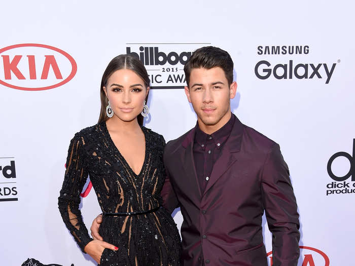 Nick Jonas, wearing Kenzo, arrived with girlfriend Olivia Culpo, who was in an Elie Saab jumper. He later performed his hit song "Jealous" during the show.