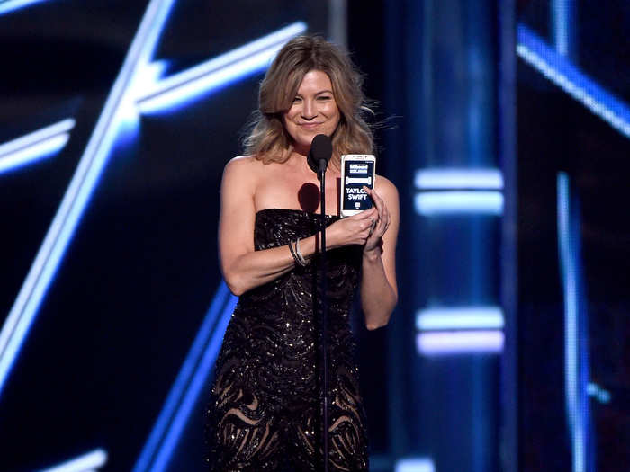 Ellen Pompeo, wearing a Zuhair Murad Couture jumpsuit, presented Taylor Swift with one of her eight awards of the evening.