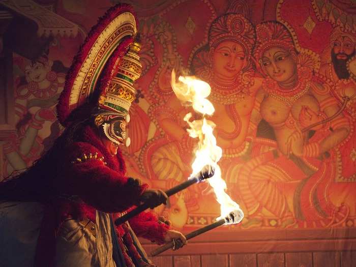 Kathakali is a stylized Indian dance-drama, noted for its attractive make-up of characters, elaborate costumes, detailed gestures, and defined body movements. This scene was called "Tapas Attam."