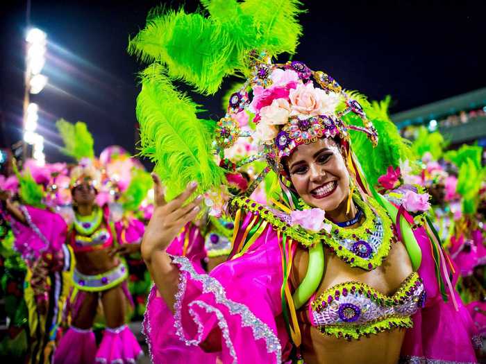 Rio de Janeiro, Brazil, hosts the biggest carnival in the world with stunning costumes and dancers, a massive parade, and tons of street parties.