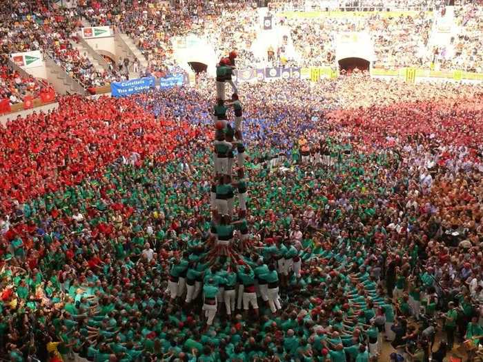 Every two years, thousands flock to the Concurs de Castell in Tarragona, Spain, to form the tallest and strongest human towers in the world. Some of the human towers go as high as 10 stories.