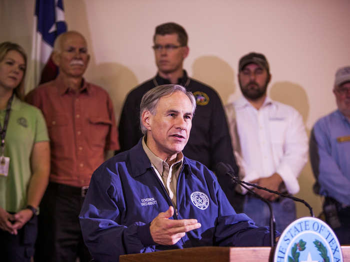 Texas Gov. Greg Abbott spoke at a news conference at the Wimberley Community Center on Monday, detailing recovery efforts in the area.