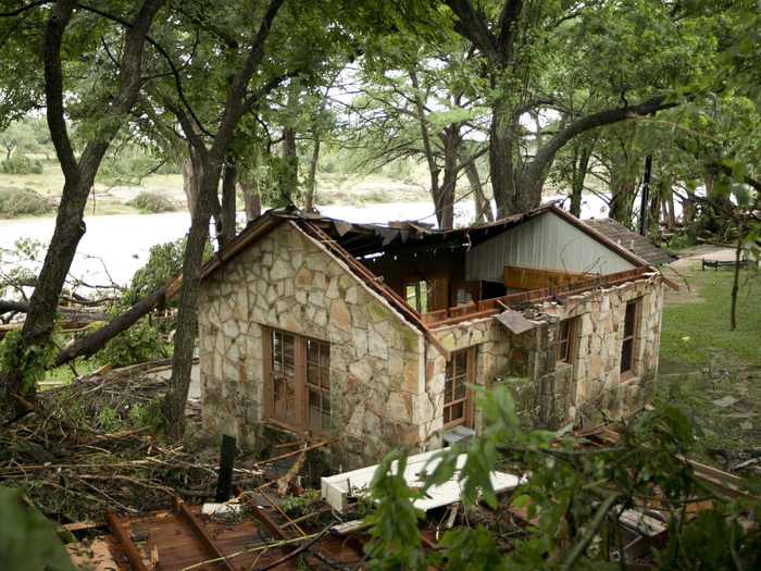 This cabin on the banks of the Blanco River was all but destroyed after flooding in Wimberley on Sunday.