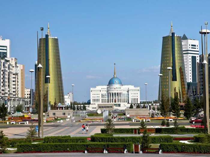 Two tall golden towers line the long open route towards the Ak Orda Presidential Palace, the official workplace of president Nursultan Nazarbayev.