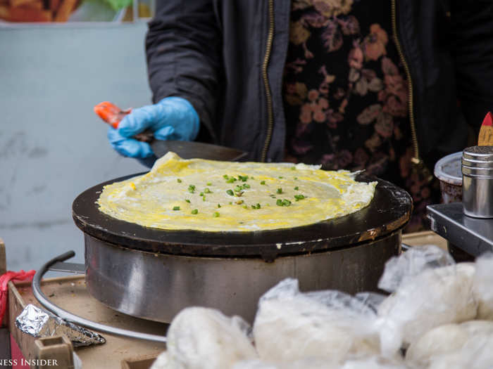 And these savory egg and scallion pancakes, which is typical street food in China.