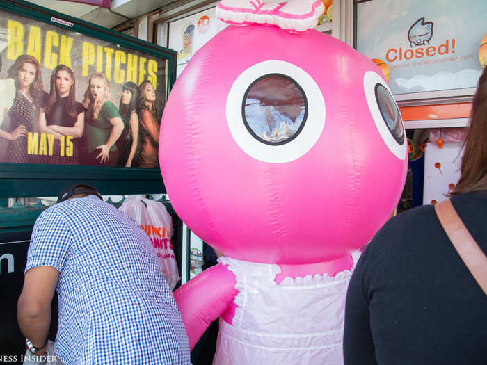 CoCo Fresh Tea & Juice had the longest line of any café. I saw some people take pictures with the inflated mascot.