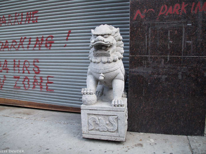 Large Chinese dragon statues guarded hotel entrances and parking garages.