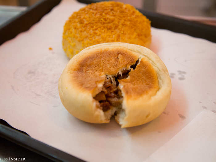 I tore the crispy pork bun in half and discovered a chopped meat and onion mixture, served cold, inside the bread. The dough tasted sweet like challah, but the meat