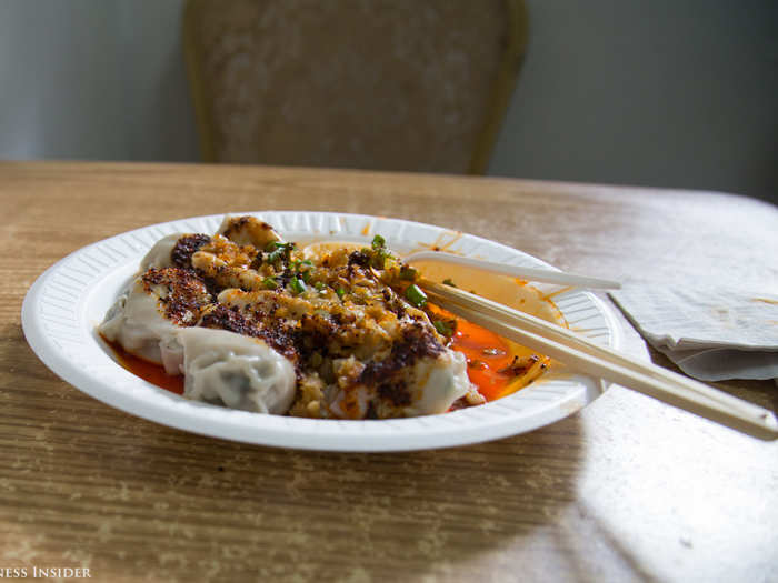 A woman sitting next to me recommended I swap out my chopsticks for a spoon, so that I could scoop up the chili oil dressing, roasted chilies, and pickled Chinese radishes in each bite. It was magnificent.