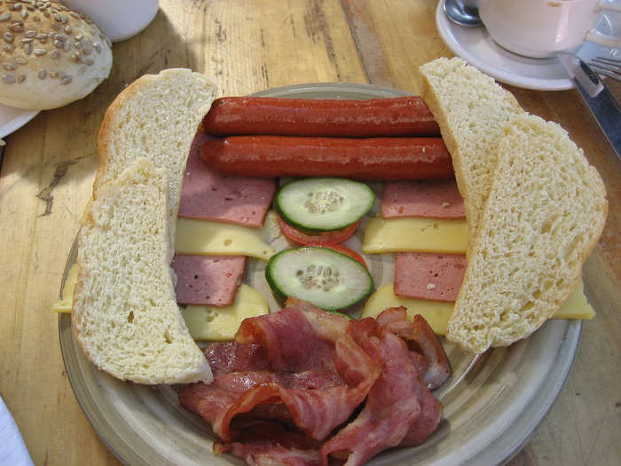 GERMANY: A typical breakfast is made up of cold meats, including sausages, local cheeses, and fresh baked bread.