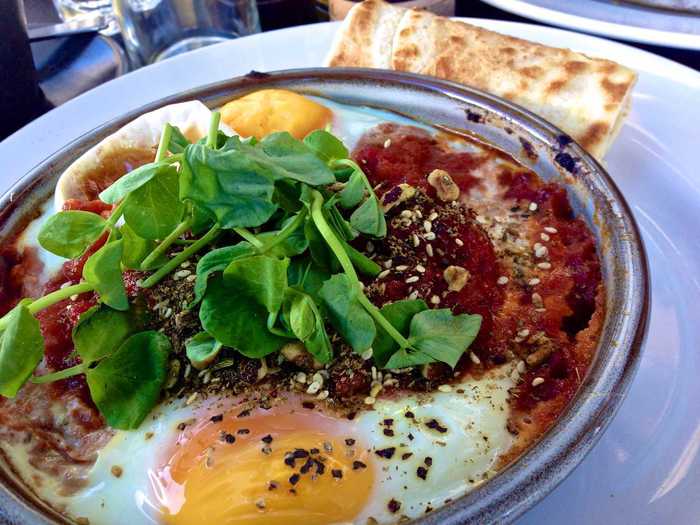 ISRAEL: A popular Israeli breakfast dish is shakshuka: eggs cooked in a spicy tomato sauce served with pita on the side for dipping.