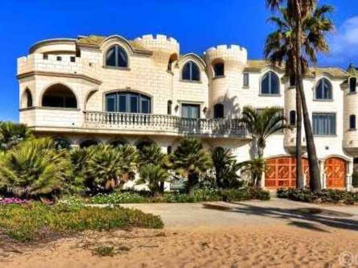 This beachfront "Sand Castle" in Sunset Beach has 180-degree views of the Catalina coastline.