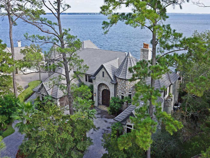 A secluded castle in Texas has an elevator and wine room, and is located on a lake.