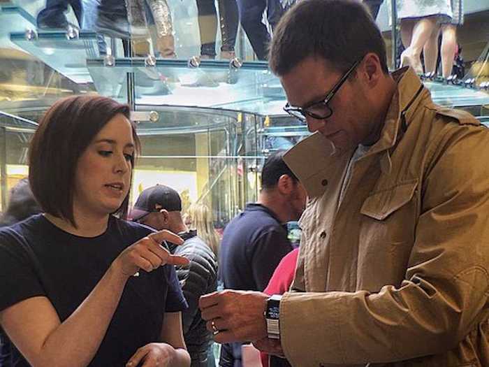 American football star Tom Brady was photographed trying on an £859 stainless steel metal link bracelet version of the Apple Watch.