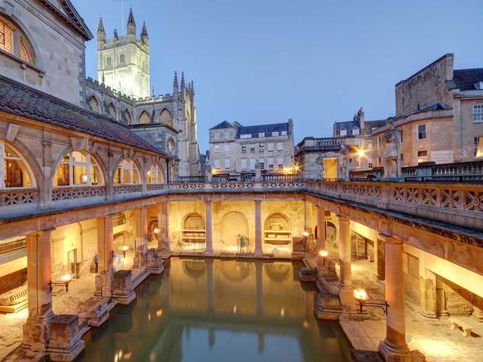 Bath, England, is home to original Roman baths, including the Great Bath. Besides visiting the baths, you can also explore castles and other towns in the English countryside. While it