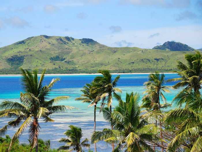 Blue lagoons and rugged landscapes make Fiji a honeymoon spot suited for everything from mountain climbing to surfing to scuba diving to zip lining.