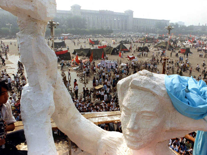 They even unloaded a 30-foot styrofoam statue, modeled on the Statue of Liberty, in the square.