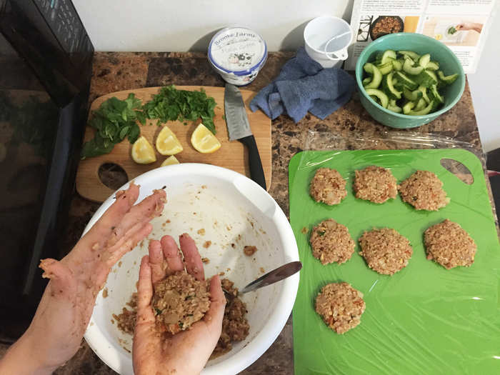 But then I had to mix the aromatics with the ground turkey in a big bowl and make 12 sticky patties. My hands were covered in bulgur, turkey, and spices.