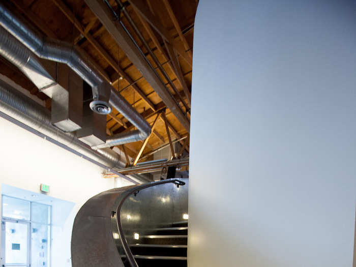 All around the office are spiral staircases that lead to bird-nest-like offices.