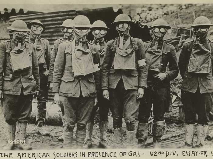 This 1918 picture shows American soldiers in France wearing gas masks.