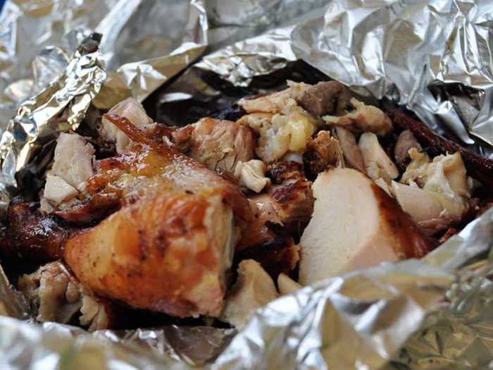 In Jamaica, jerk chicken is cooked over charcoal and seasoned with spices to produce a smoky flavor all wrapped up in a crispy layer of the chicken