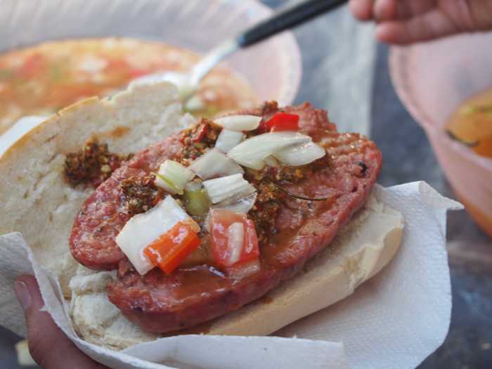 Choripán is a popular choice in Argentina, Bolivia, Brazil, Chile, Peru, Puerto Rico, Uruguay, and Venezula. The sandwich includes grilled chorizo sausage, crusted bread, and chimichurri sauces.