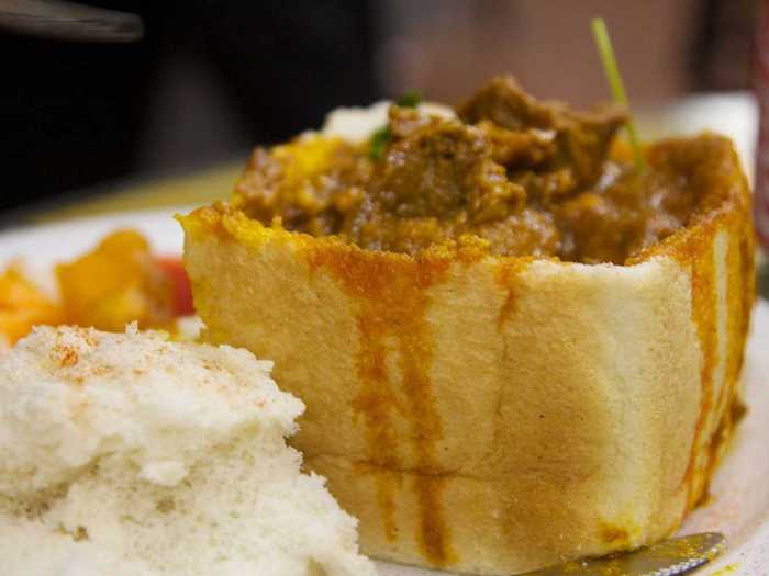 Bunny chow, in South Africa, is a hollowed piece of bread stuffed with curry, or masala.